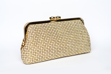 Beyaz zemin üzerine Pırlantalı altın debriyaj