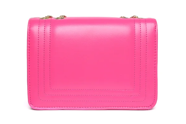 Bolso de señora rosa con cadena dorada sobre fondo blanco — Foto de Stock