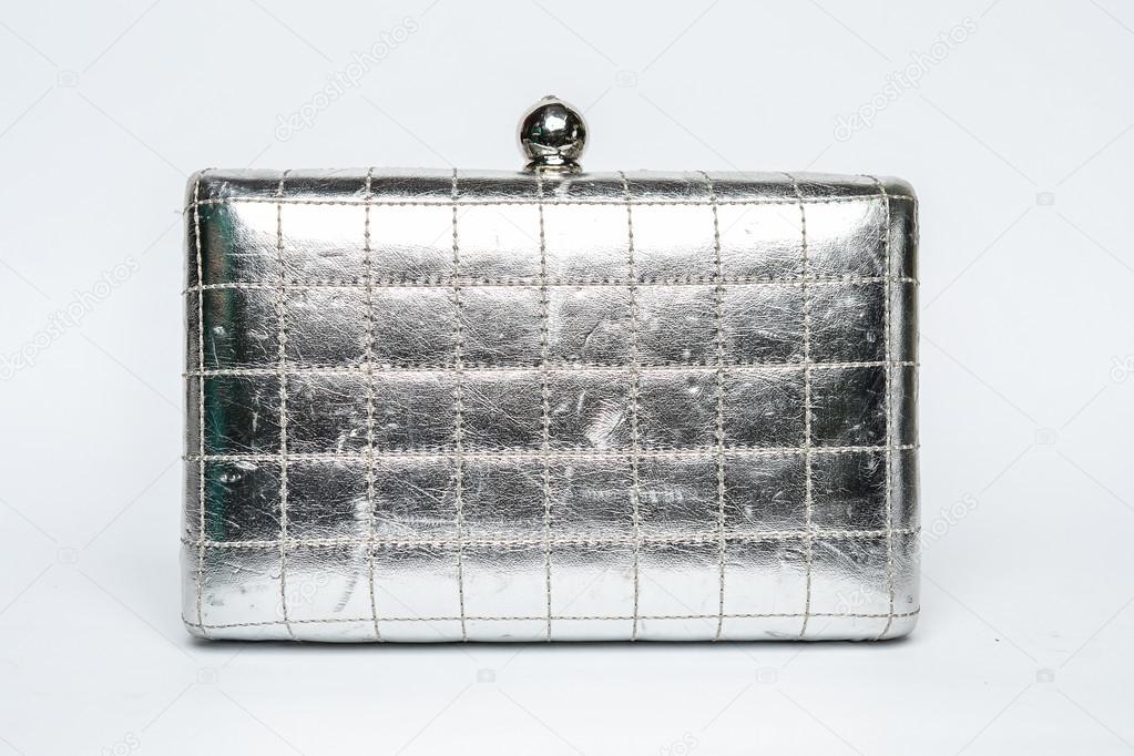 silver clutch on a white background