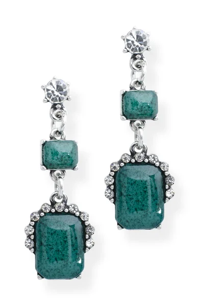 Silver earrings with emeralds isolated on white — Stock Photo, Image