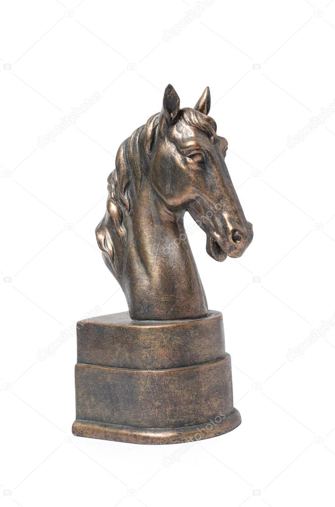 bronze statuette of a horse isolated on white