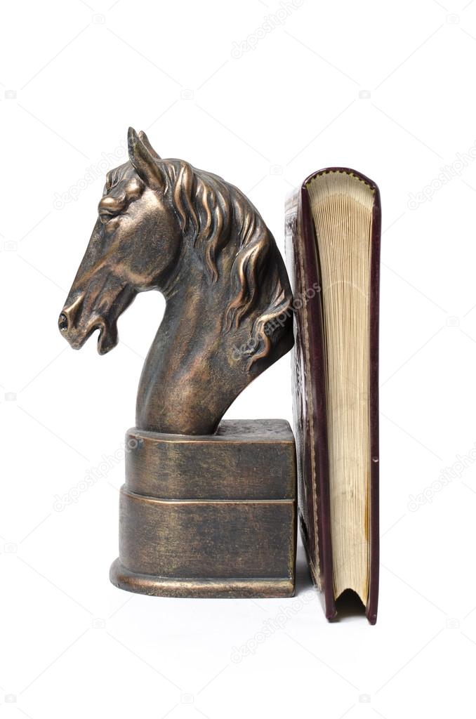 bronze statuette of a horse isolated on white