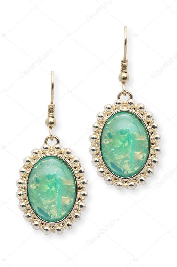 earrings with green stones isolated on white