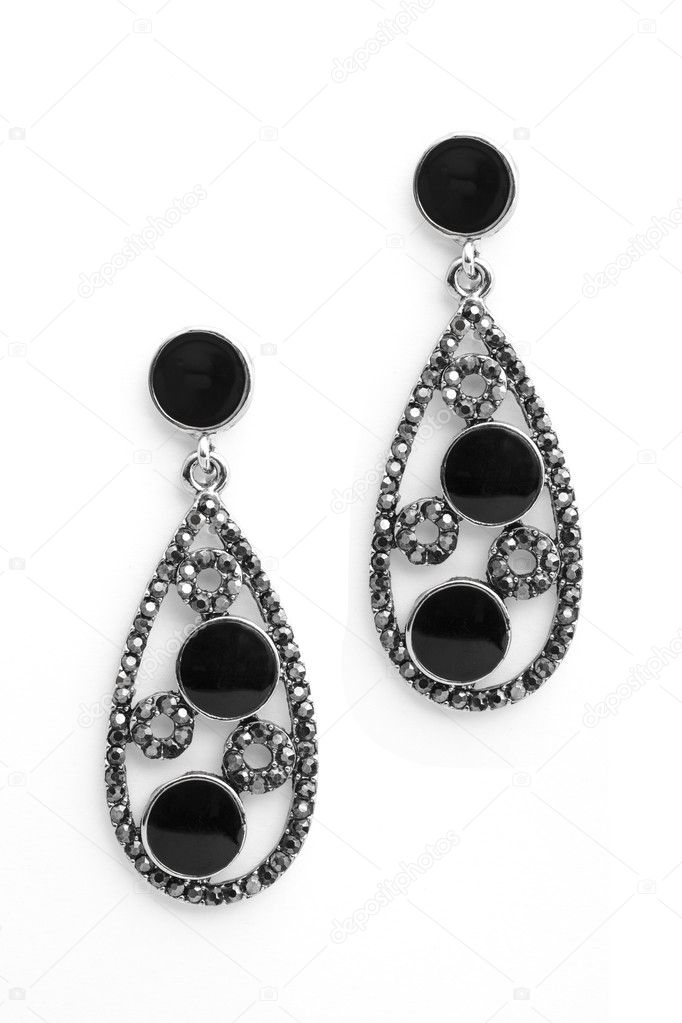 silver earrings with onyx isolated on white