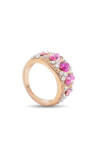 Anillo de oro con piedras rosas sobre fondo blanco — Foto de Stock