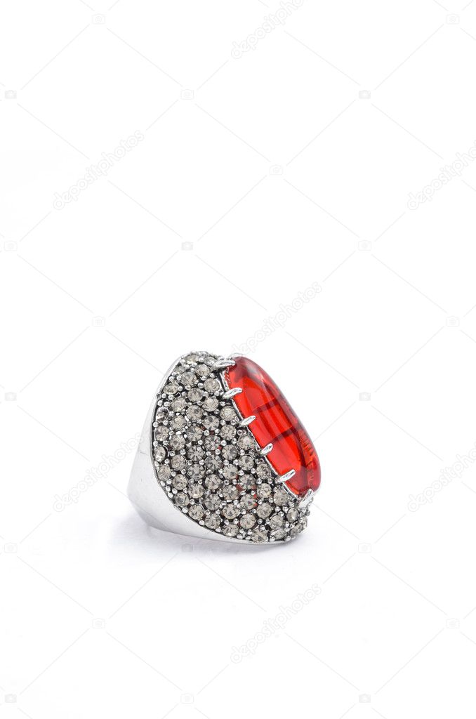 silver ring with ruby on white background