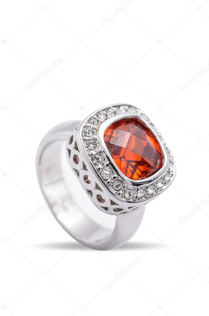 silver ring with ruby on white background