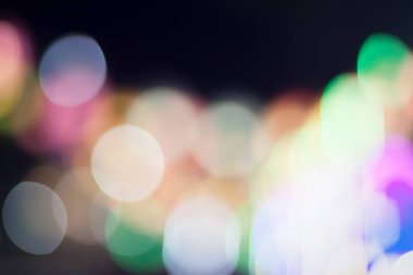 Ampulün soyut bulanık Bokeh 'i mavi ve sarı yeşil bulanık arka plan