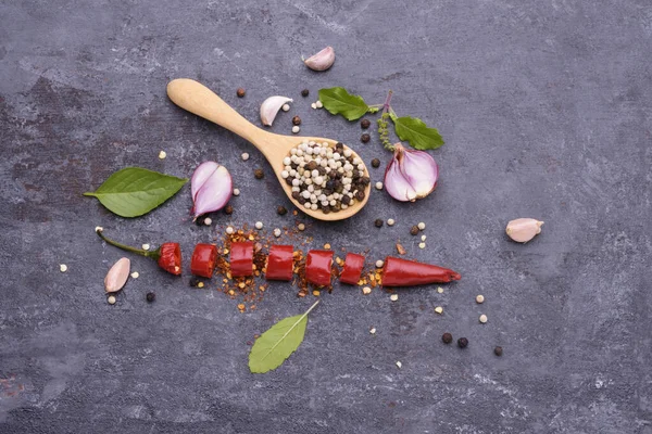 Pepper Wooden Spoon Red Chili Basil Garlic Spices Placed Black — Stock Photo, Image