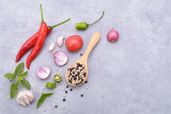 Pepper Wooden Spoon Red Chilies Shallots Garlic Basil Coriander Leaves — Stock Photo, Image