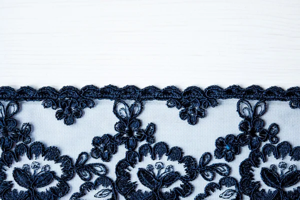 Blå spets tyg för dekoration och sömnad. — Stockfoto