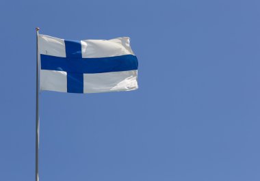 Finnish flag on blue sky clipart