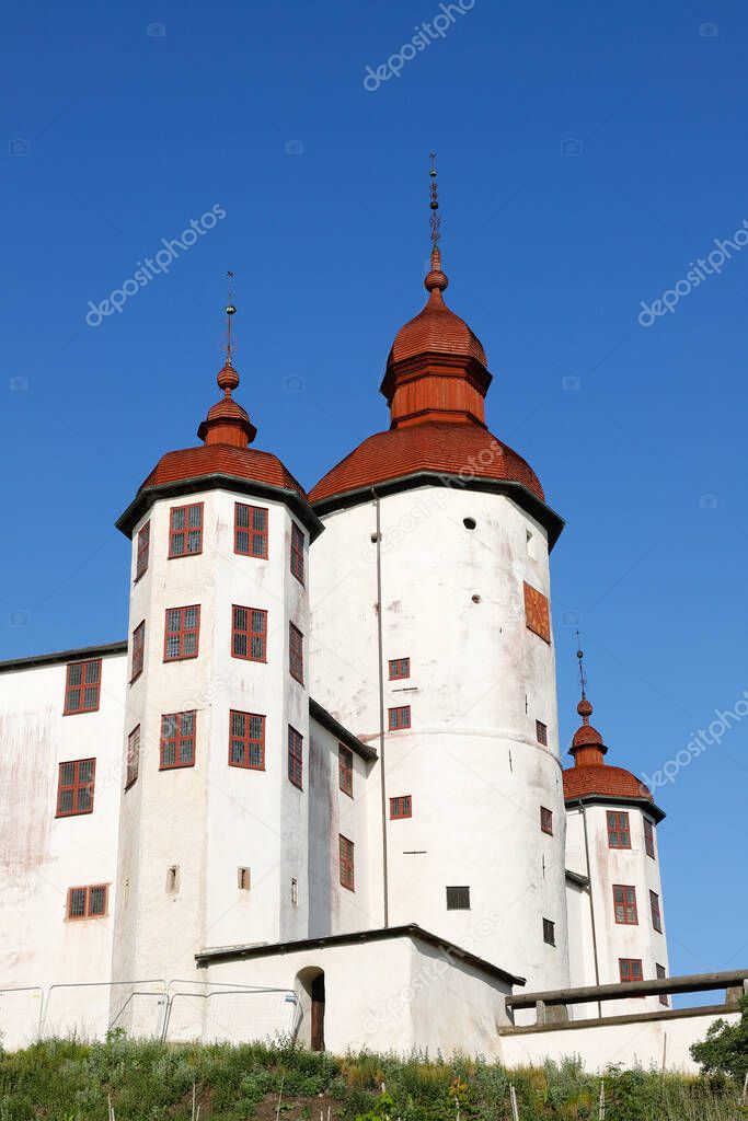 Low angle view of the Lacko castle front towers located in Swedish province of Vastergotland.