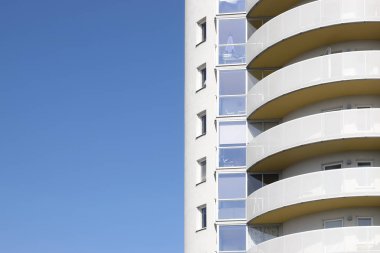 Close-up view of a modern mulistorey apartment building.
