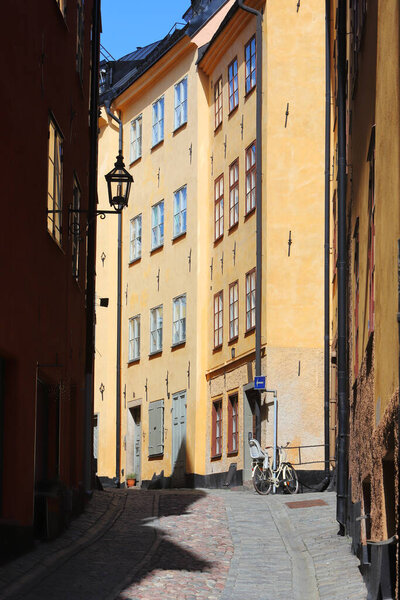 Stockholm Old town narrow alley with apartment buildings.