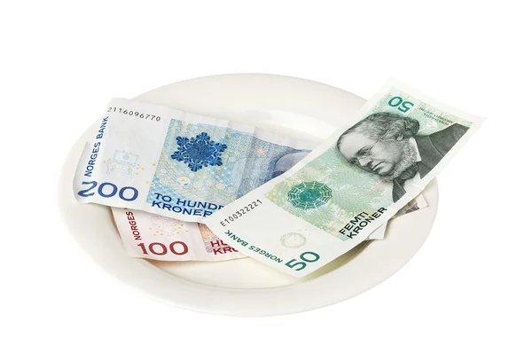 Dinheiro norueguês em um prato — Fotografia de Stock