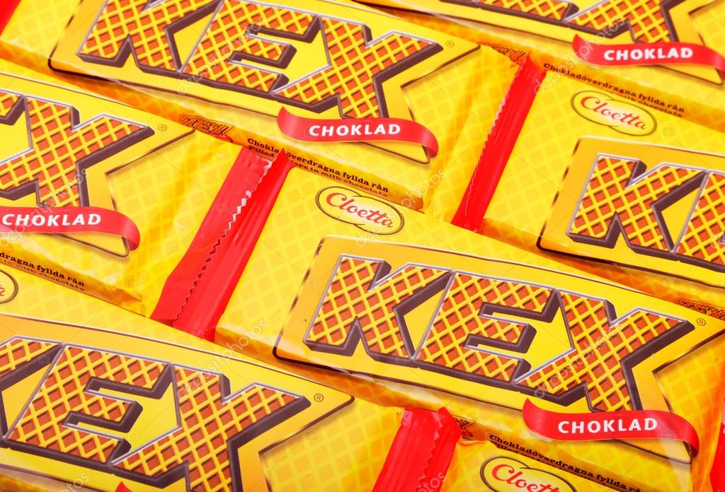 Several packages of Cloetta Kexchoklad, consisting of chocolate-coated wafers.