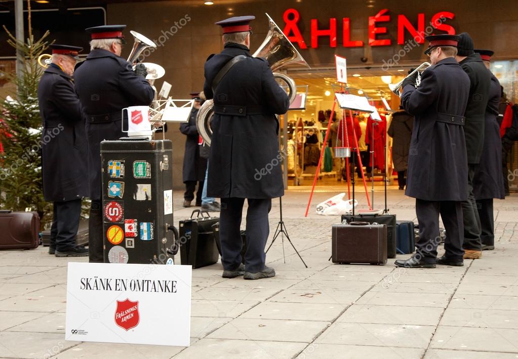 Sodertalje, Sweden - December 8, 2012:Donate one caring is the Salvation Army's message for Christmas, when they collect money for the vulnerable in society during the current holiday shopping season