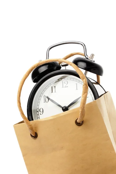 Reloj despertador en una bolsa —  Fotos de Stock