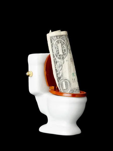 Tirar el dinero por el inodoro —  Fotos de Stock