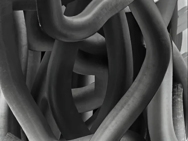 Gri yuvarlak şekilli bükülmüş Spiral Tüpler