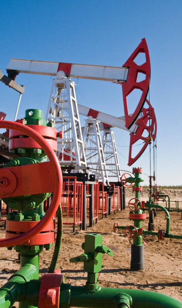  Oil pumping units (pumps) for pumping oil from the bowels during operation. Fragment of industrial equipment.