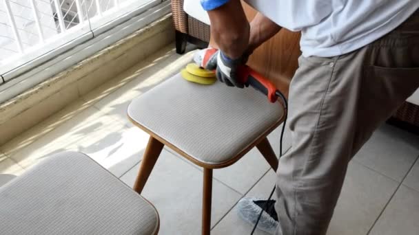 Professional Using Electric Polisher Brush Clean Chair Seat — Stock Video