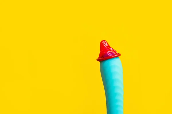 Sex Toy Blue Dildo Vibrator Red Condom Yellow Desk Copy — Fotografia de Stock