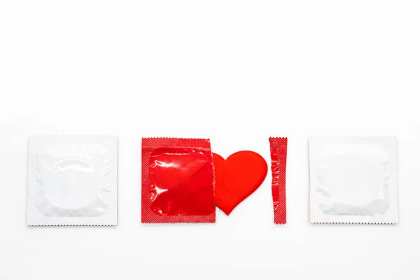 Red Blank Condom Packed Red Heart Shape Empty Space Text — Stock Photo, Image