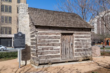 John Neely Bryan Cabin at Pioneer Plaza in Dallas,  Texas clipart