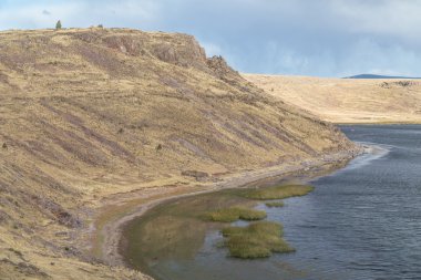 Göl kıyısında Umayo Sillustani Hill yakınındaki: Puno, Peru