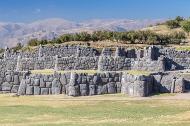 Stone Walls at Saksaywaman, Saqsaywaman, Sasawaman, Saksawaman, Sacsahuayman, Sasaywaman or Saksaq Waman citadel fortress in Cusco,  Peru clipart