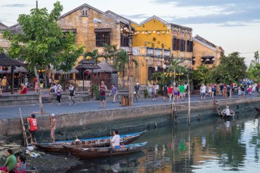 HOI AN, VIETNAM - CIRCA AUGUST 2015: People walking on the streets of old town Hoi An,  Vietnam