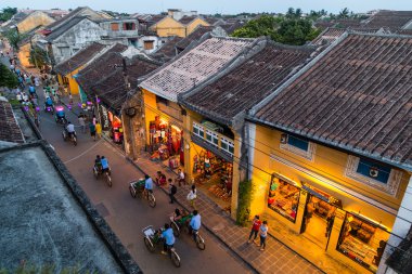 HOI AN, VIETNAM - CIRCA AUGUST 2015: People walking on the streets of old town Hoi An,  Vietnam
