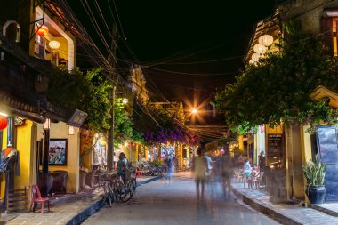 HOI AN, VIETNAM - CIRCA AUGUST 2015: People walking on the streets of old town Hoi An, Vietnam by  night