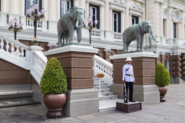 BANGKOK, THAILAND - CIRCA AUGUST 2015: Royal ceremonial guard stands outside Chakri Maha Prasat Hall, Bangkok,  Thailand