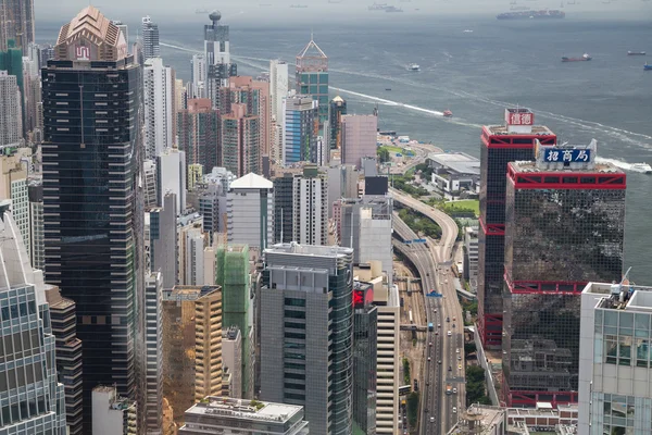 Hong Kong, SAR China - circa July 2015: Dense high rise office buildings of Hong  Kong — Stock Photo, Image