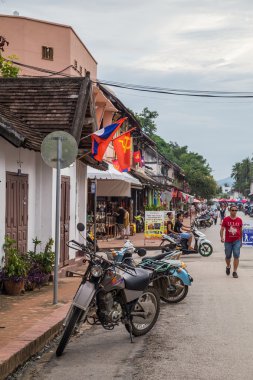Luang Prabang, Laos - circa August 2015: Tourists on the streets of Luang Prabang,  Laos
