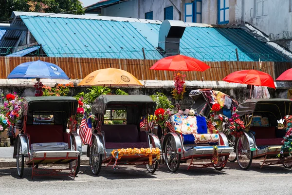 Georgetown, Penang/Malaysia - circa October 2015: Rikshaw carriages in Georgetown, Penang,  Malaysia — Stockfoto