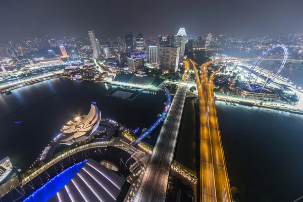 SINGAPORE, SINGAPORE - CIRCA SEPTEMBER 2015: Marina Bay panorama of Singapore from the observatory on the top of Marina Bay Sands hotel with visible Formula   One