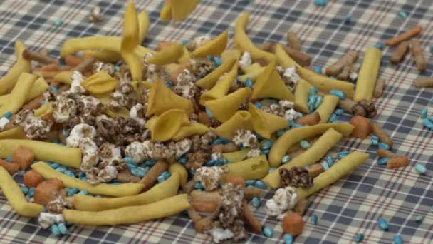 Close up view of of various crunchy snacks on kitchen table — Stock Footage Close View Various Crunchy Snacks Kitchen Table Stock Video