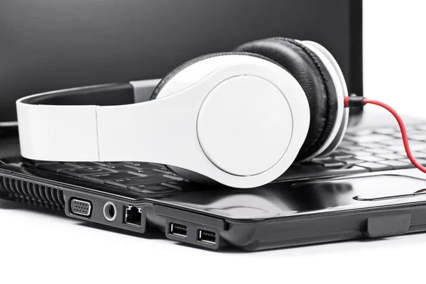 Headphones on a laptop — Stock Photo, Image