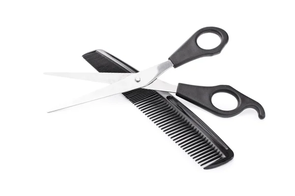 Scissors and comb Royalty Free Stock Images