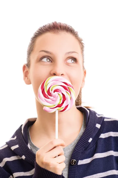 Jong meisje met een lolly — Stockfoto