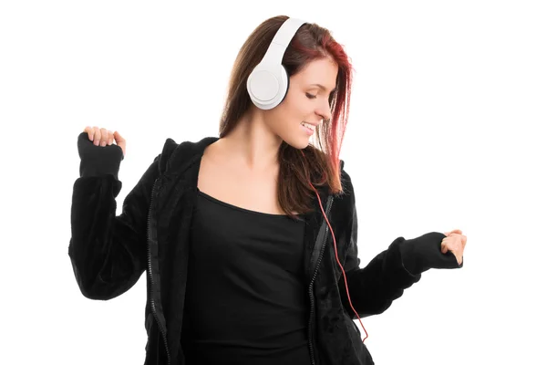 Młoda dziewczyna w Bluza z kapturem tańczy do swojej ulubionej piosenki — Zdjęcie stockowe