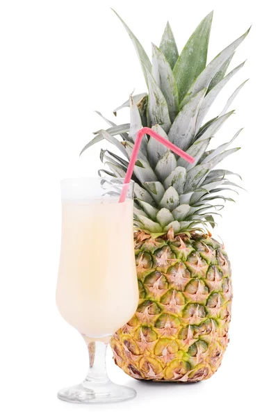 Pineapple and a glass of juice — Stock Photo, Image