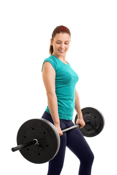 Young girl holding a barbell — Stock Photo, Image