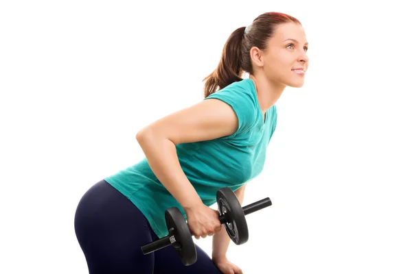 Young girl lifting a barbell — Stock Photo, Image