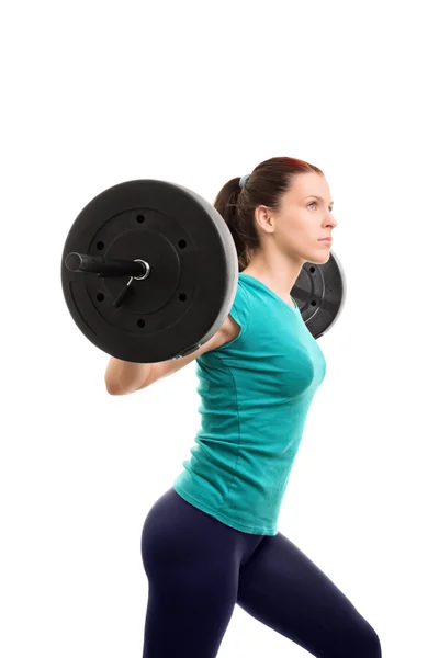 Young girl lifting weights — Stock Photo, Image