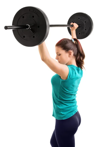 Girl holding weights up — Stock Photo, Image